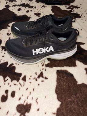 Hoka Black and White Running Shoes with Neon Accent